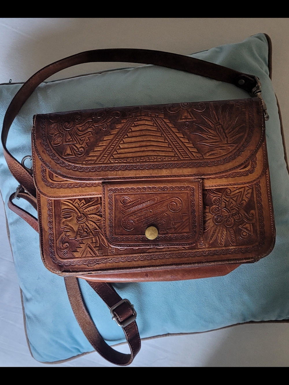 Hand-Tooled Brown Leather Crossbody Satchel.